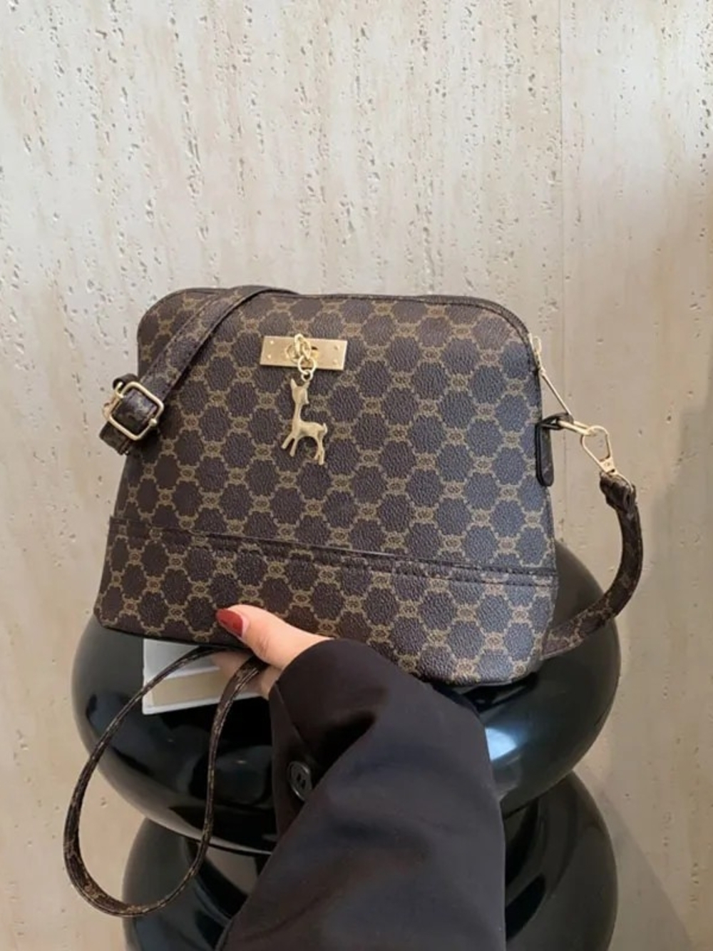 Elegant Brown Patterned Shoulder Bag with Gold Deer Charm
